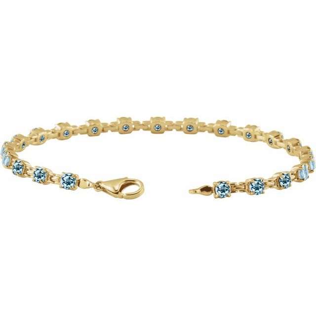 14k-yellow-natural-sky-blue-topaz-7-1/4"-line-bracelet