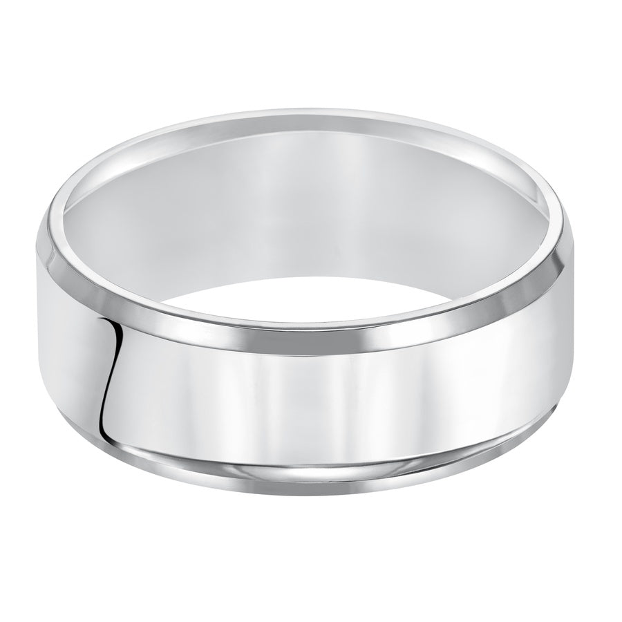 This comfort fit wedding band is crisp and contemporary featuring a high polished beveled edge design.