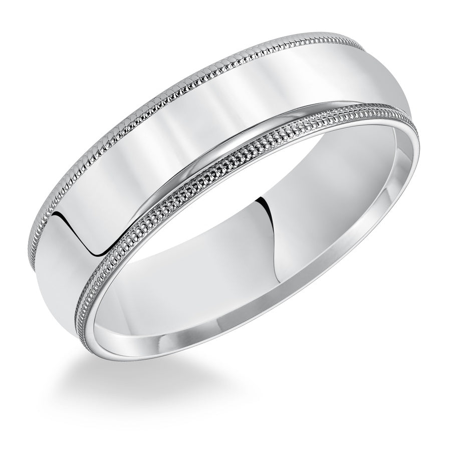 Classic styling is infused into this low-dome, comfort fit wedding band design featuring a high polished finish with delicate milgrain detailing.