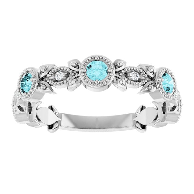 14k-white-natural-blue-zircon-&-.03-ctw-natural-diamond-leaf-ring