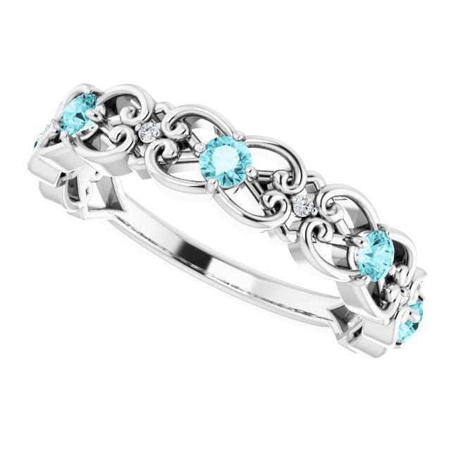 14k-white-natural-blue-zircon-&-.02-ctw-natural-diamond-scroll-ring