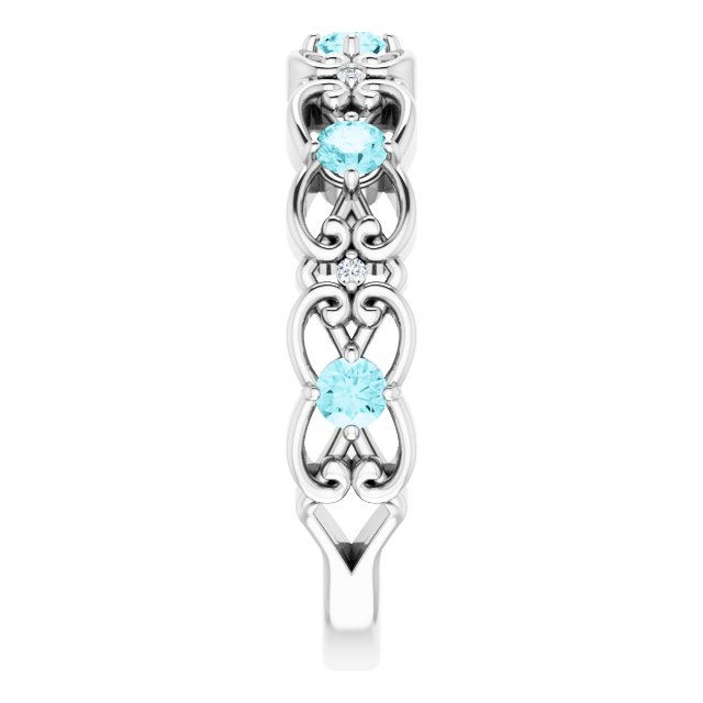 14k-white-natural-blue-zircon-&-.02-ctw-natural-diamond-scroll-ring