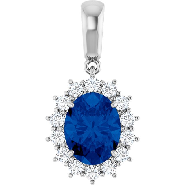 14k-yellow-natural-swiss-blue-topaz-&-1/3-ctw-natural-diamond-pendant