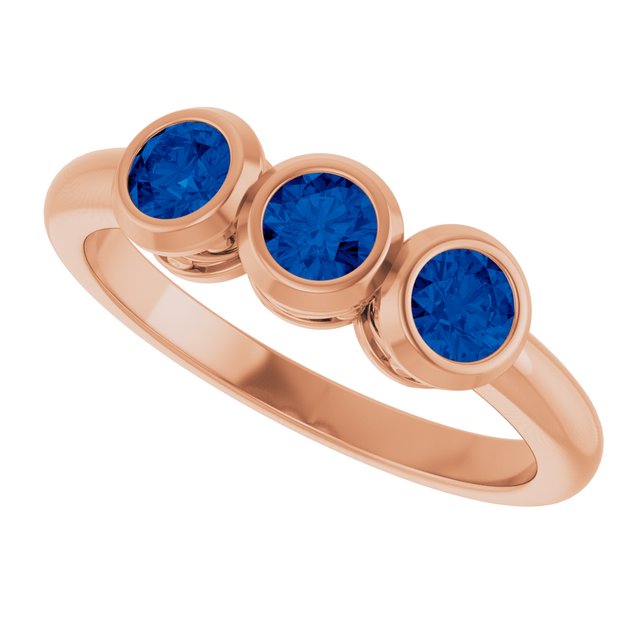 14k-rose-gold-lab-grown-blue-sapphire-three-stone-bezel-set-ring