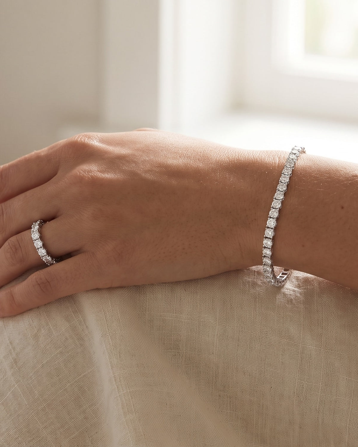 Lab-grown diamond tennis bracelet in 14k white gold on the wrist